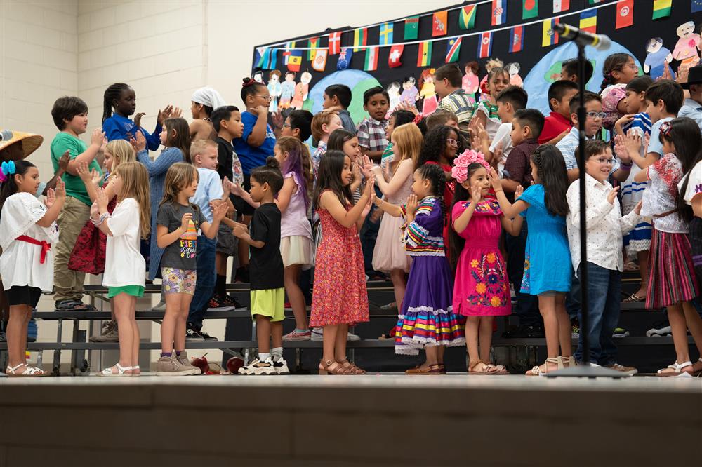 Students celebrate their diverse cultures and backgrounds during Bologna Elementary School's Celebration of Nations assembly.